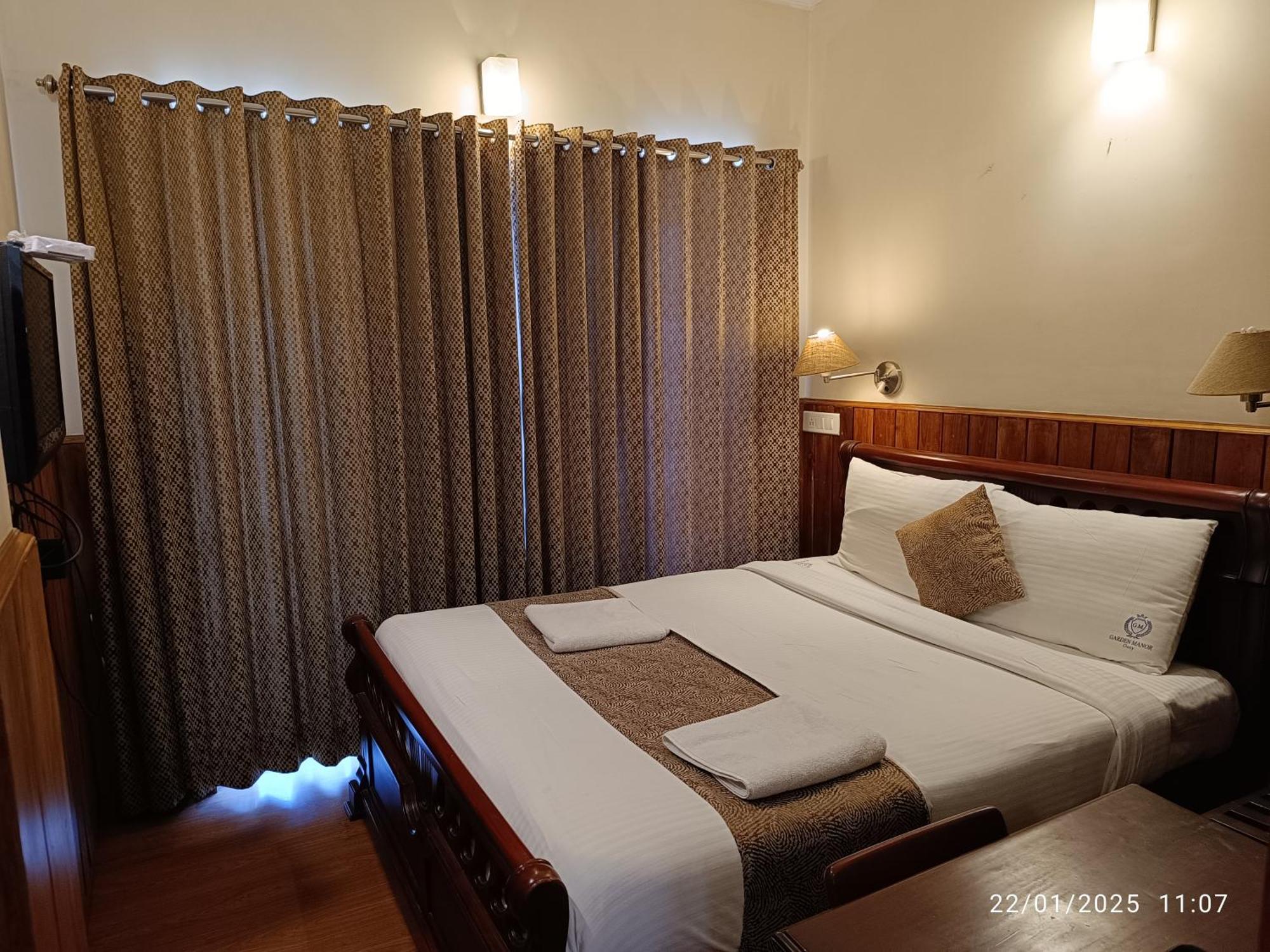 Garden Manor Hotel Ooty Ruang foto